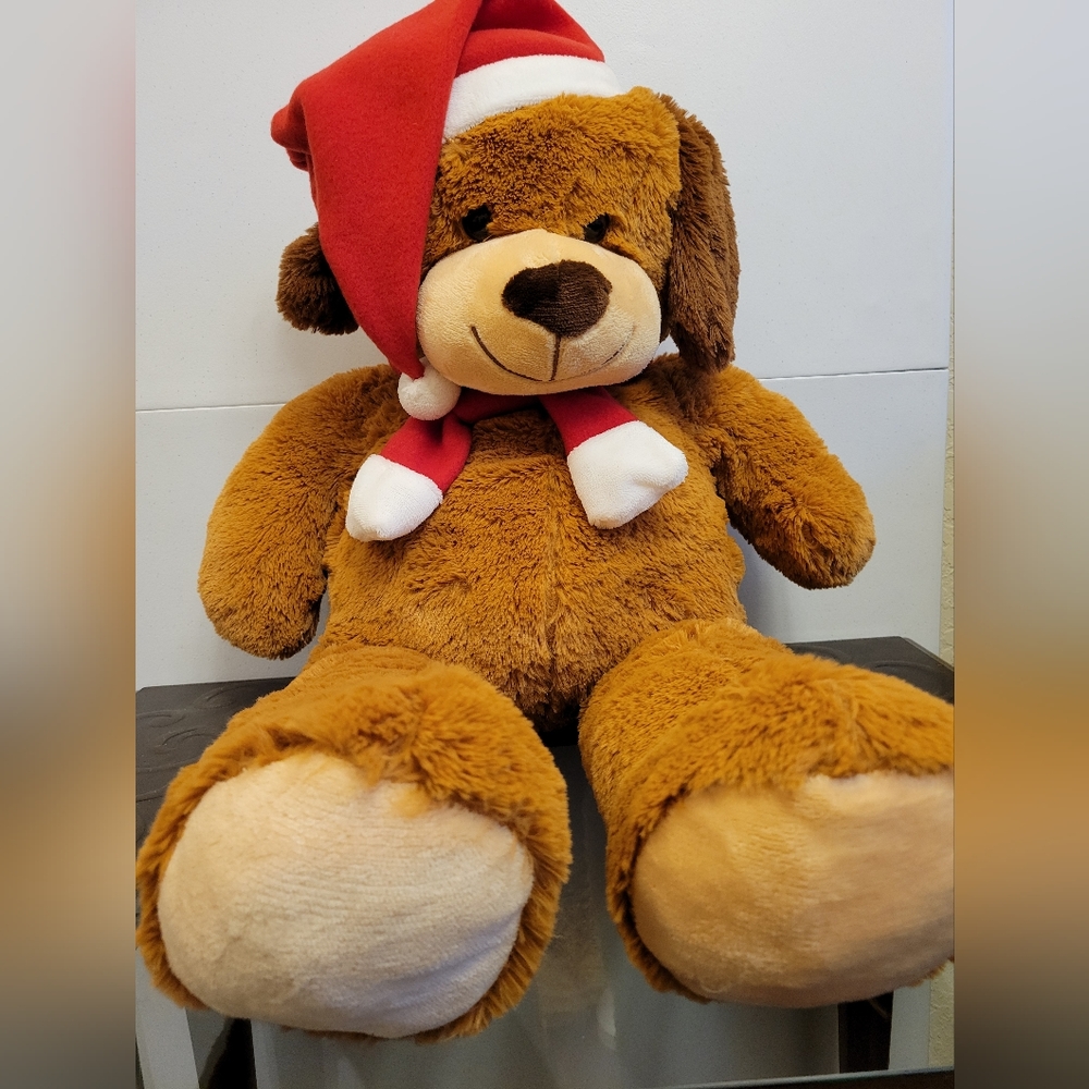 Big brown Teddy bear with Christmas hat